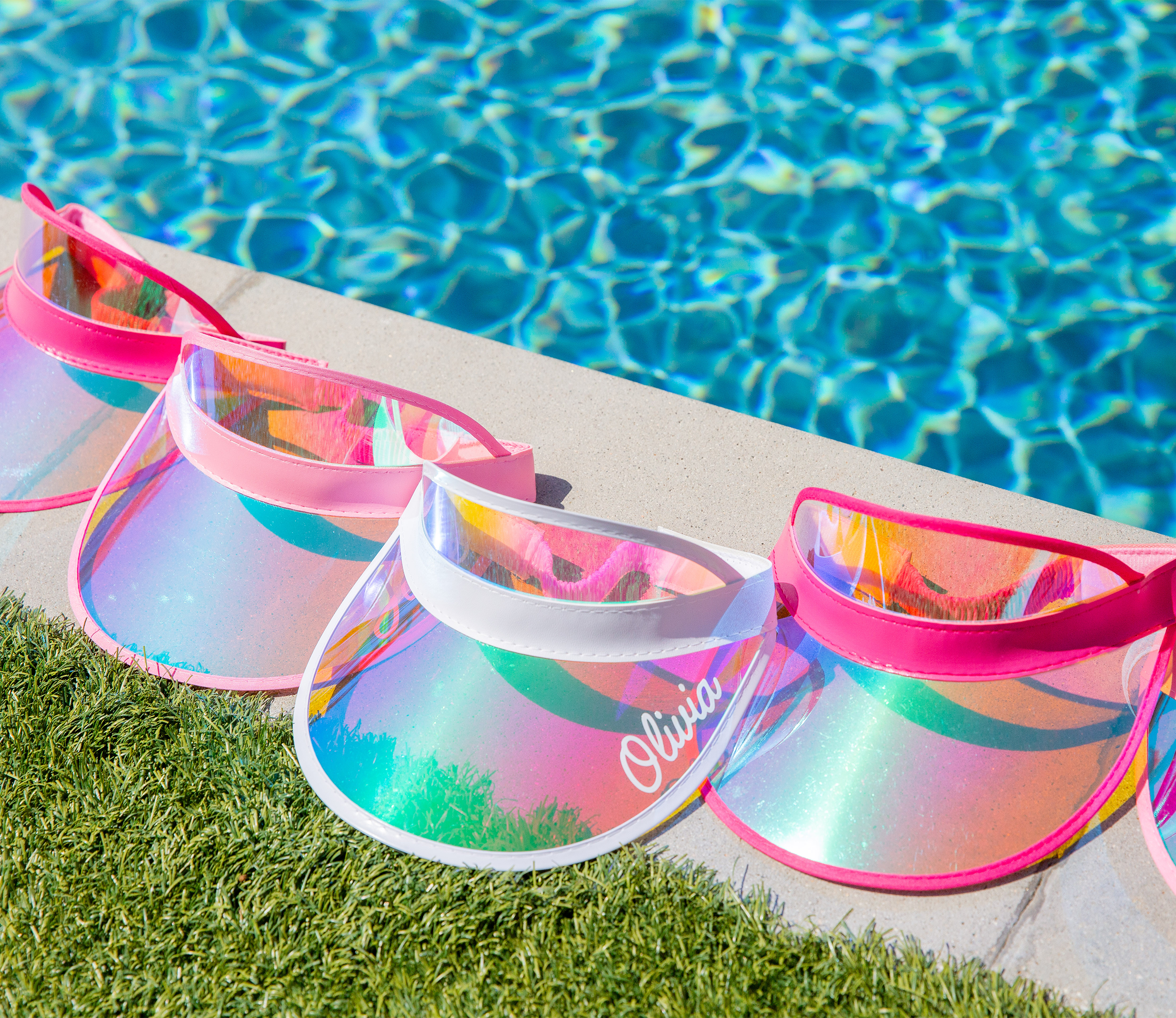 4 reusable holographic sun visors (3 pink, 1 white) customized with bride and bridesmaids’ names—perfect personalized party favors for country club themed bachelorette parties