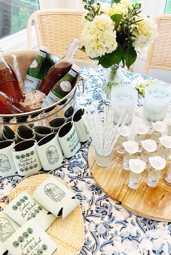 Cowboy boot shot glasses with mini cowgirl hats – fun bachelorette party table decor and reusable party favors